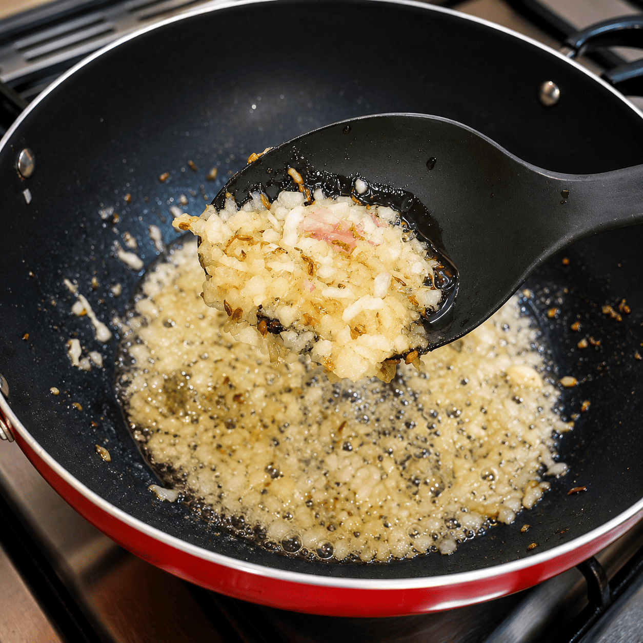 Cooking grated onion for Egg Lababdar