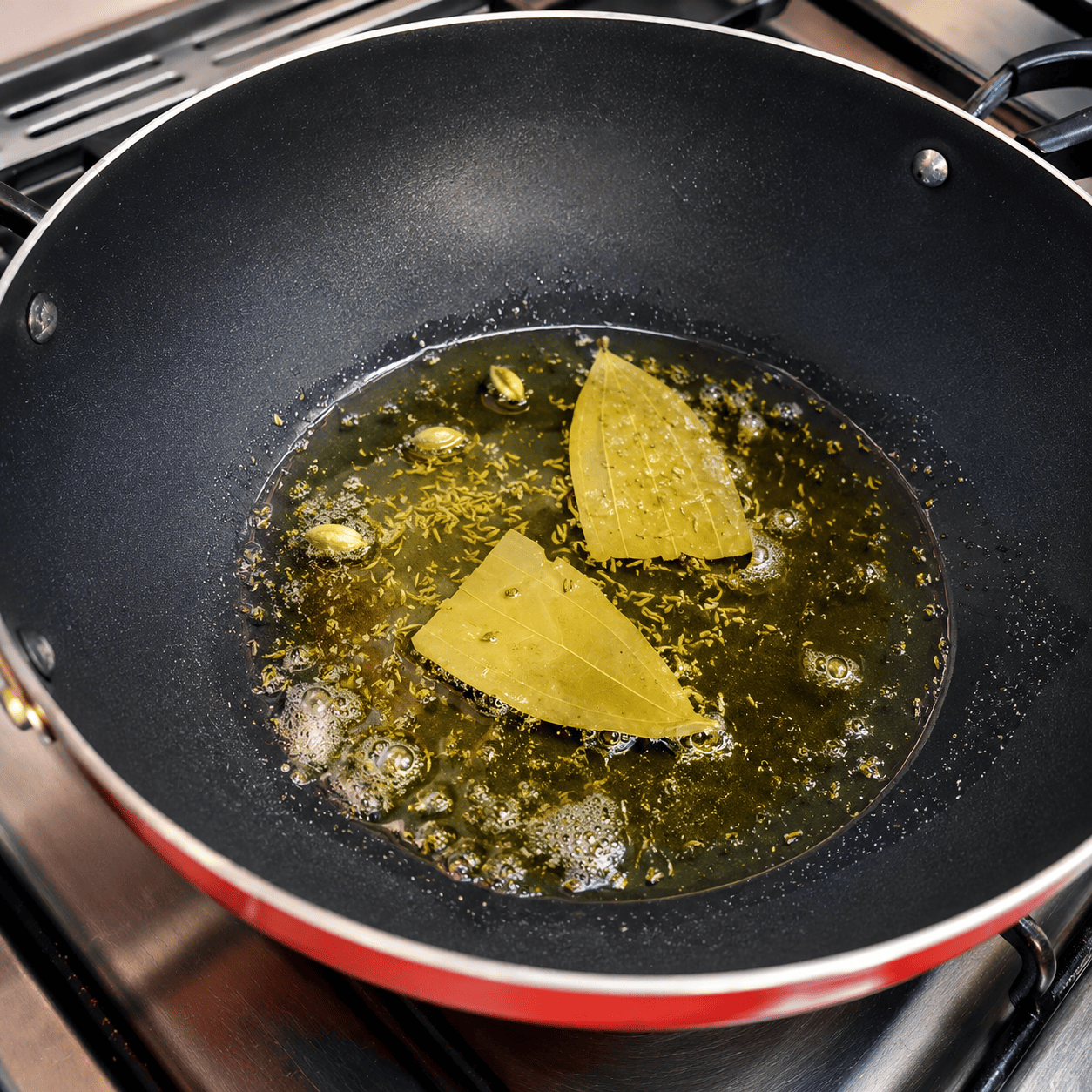 Temper the whole spices for Egg Lababdar