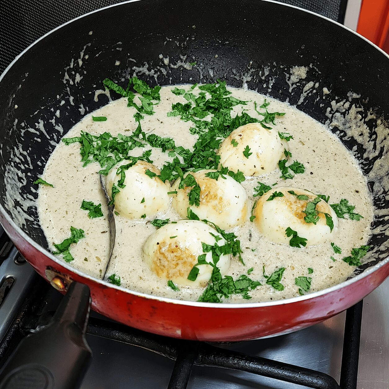 Finished Egg White Korma garnished with fresh coriander — Zaika Mazedaar