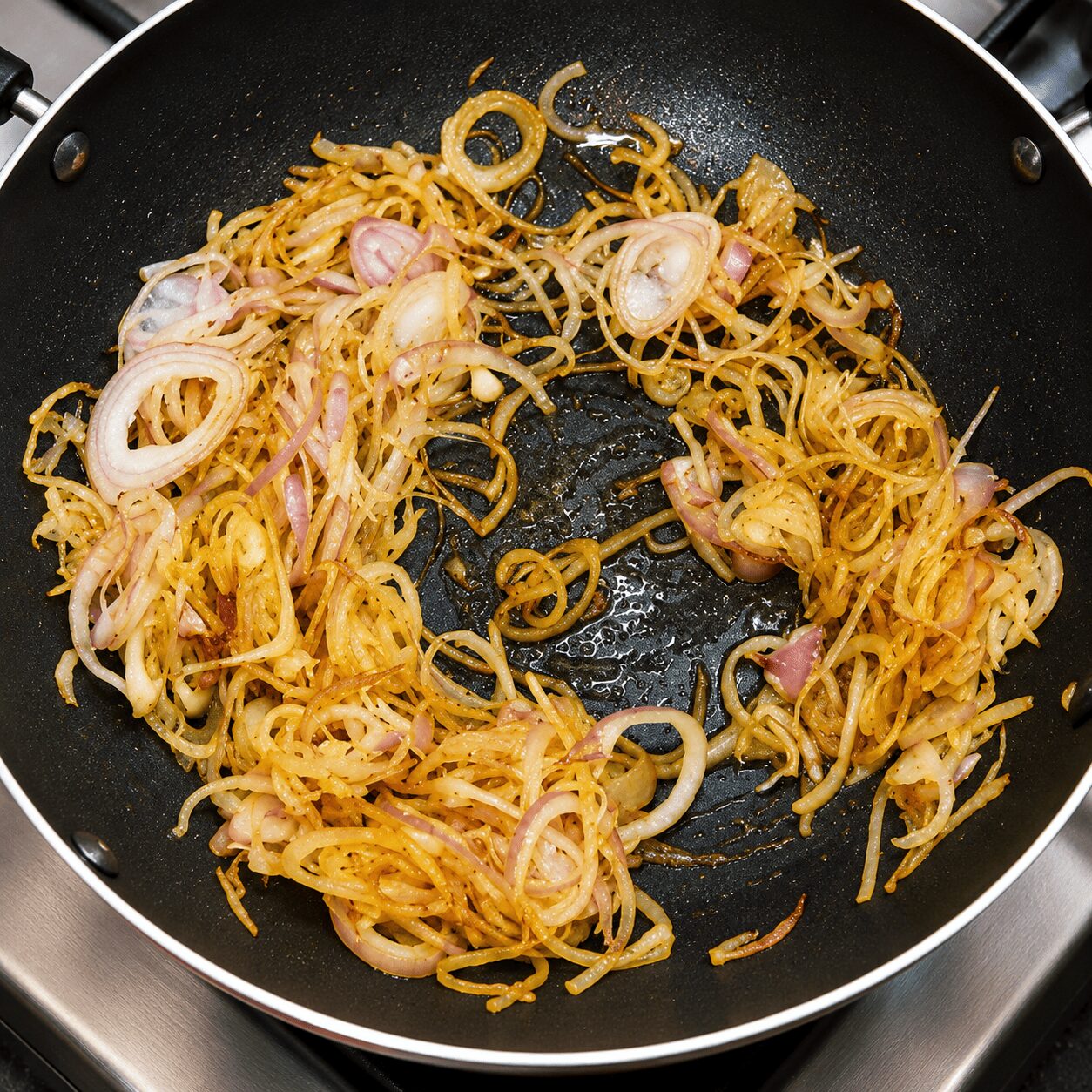 Crushed onion fried light golden brown for Anda Korma