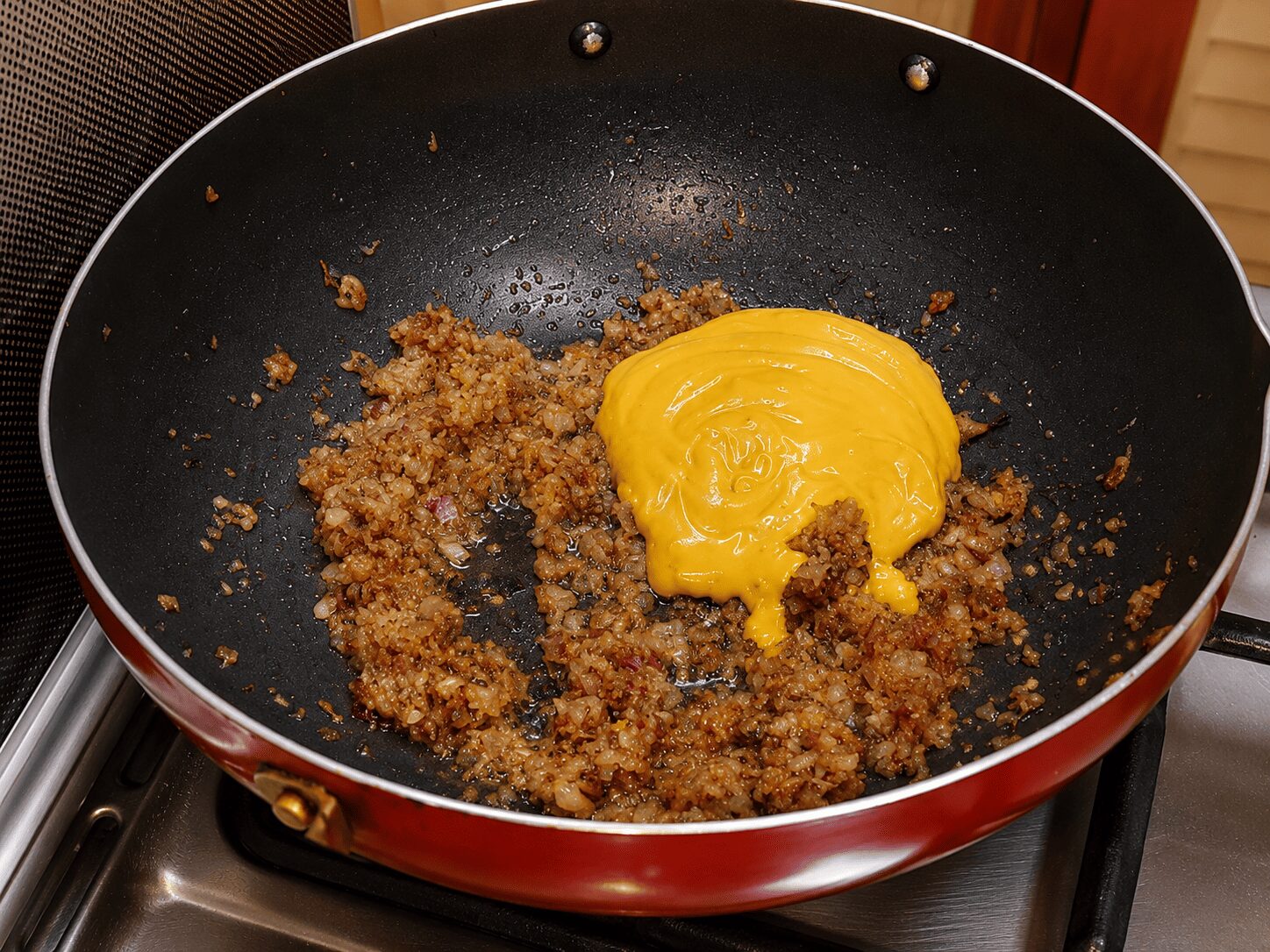 Roasting the yogurt-spice mixture into the onion until oil separates