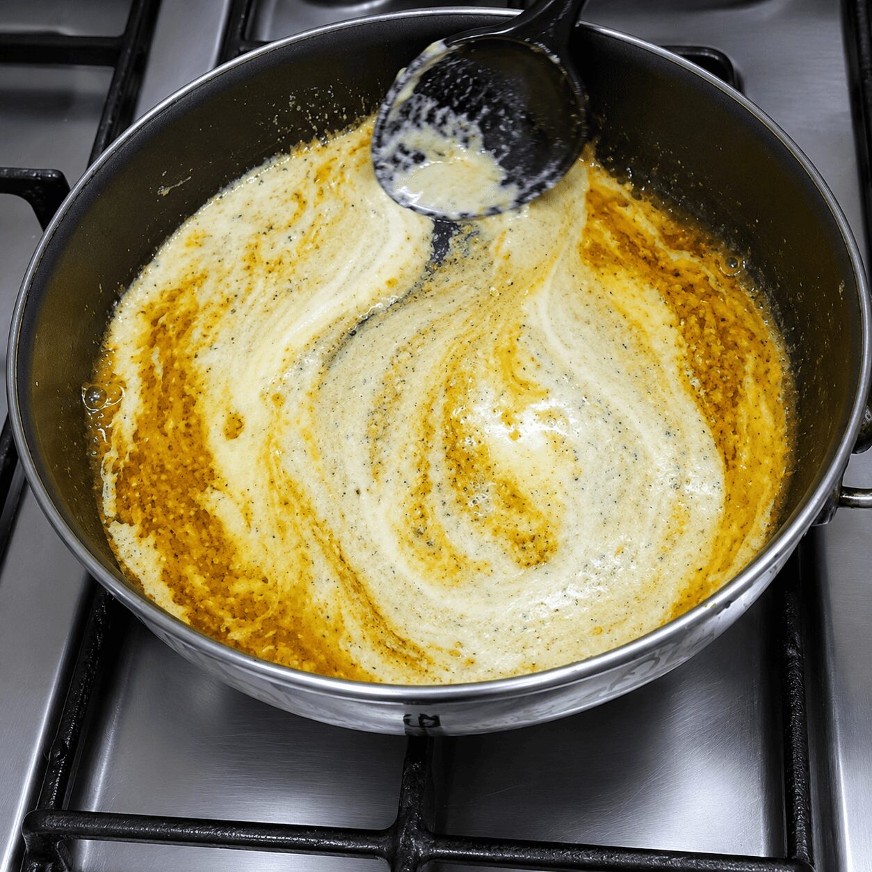 Roasting yogurt and spices into the tomato purée for Egg Butter Masala