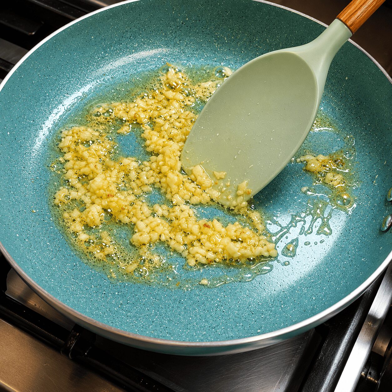 Sautéing grated garlic in butter for the Butter Garlic Egg sauce