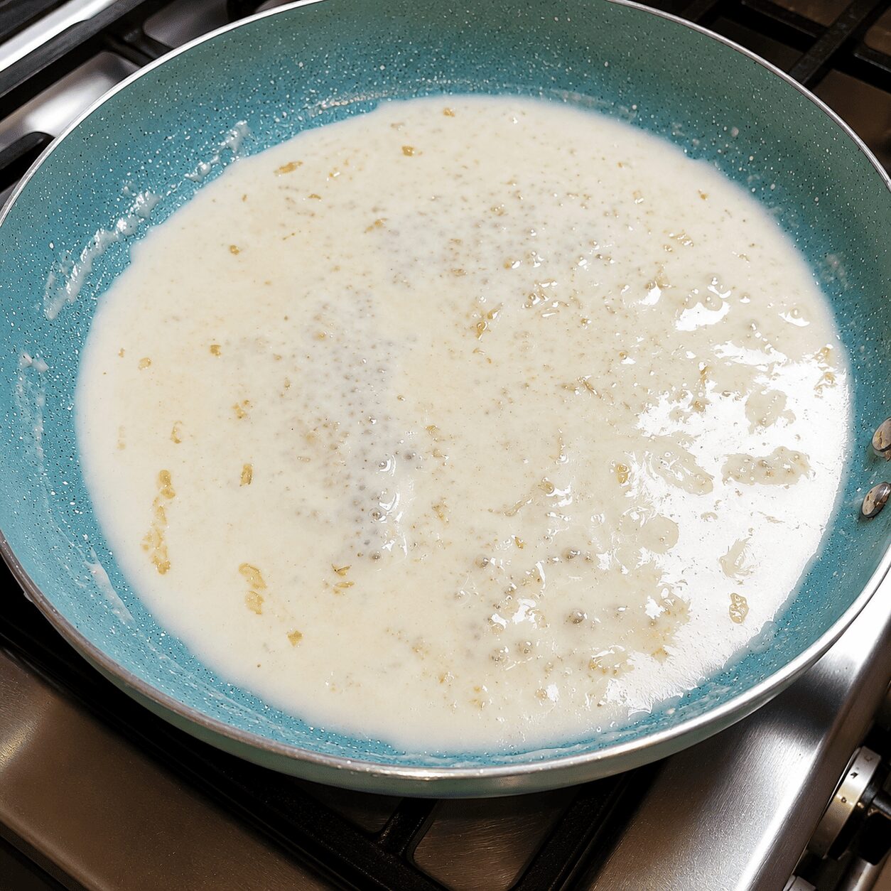 Thickening the garlic milk sauce for Butter Garlic Egg